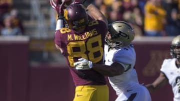 Oct 18, 2014; Minneapolis, MN, USA; Purdue Boilermakers safety Taylor Richards (4) deflects a pass intended for Minnesota Golden Gophers tight end Maxx Williams (88) in the first half at TCF Bank Stadium. Mandatory Credit: Jesse Johnson-USA TODAY Sports
