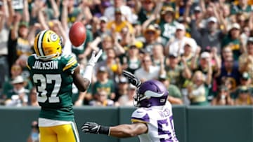 GREEN BAY, WI - SEPTEMBER 16: Josh Jackson #37 of the Green Bay Packers catches a blocked punt in front of Eric Wilson #50 of the Minnesota Vikings during the first quarter of a game at Lambeau Field on September 16, 2018 in Green Bay, Wisconsin. (Photo by Joe Robbins/Getty Images)