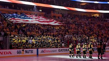Pittsburgh Penguins stand for the National Anthem. (Photo by Justin Berl/Getty Images)