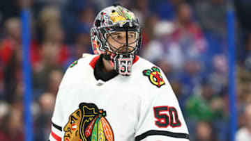 Feb 27, 2020; Tampa, Florida, USA; Chicago Blackhawks goaltender Corey Crawford (50) during the first period at Amalie Arena. Mandatory Credit: Kim Klement-USA TODAY Sports