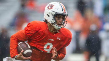 Auburn football quarterback Robby Ashford (9) runs the ball during the A-Day spring football game at Jordan-Hare Stadium in Auburn, Ala., on Saturday, April 8, 2023.