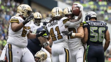 SEATTLE, WA - SEPTEMBER 22: Running back Alvin Kamara #41 of the New Orleans Saints celebrates with running back Zach Line #42 and offensive lineman Larry Warford #67 after scoring a touchdown during the second half of game against the Seattle Seahawks at CenturyLInk Field on September 22, 2019 in Seattle, Washington. The Saints won 33-27. (Photo by Stephen Brashear/Getty Images)