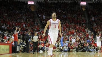 Apr 29, 2013; Houston, TX, USA; Houston Rockets shooting guard Carlos Delfino (10) shows emotion after a basket against the Oklahoma City Thunder in the fourth quarter in game four of the first round of the 2013 NBA playoffs at the Toyota Center. The Rockets defeated the Thunder 105-103. Mandatory Credit: Brett Davis-USA TODAY Sports