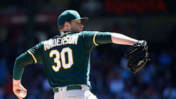 ARLINGTON, TX - APRIL 14: Brett Anderson #30 of the Oakland Athletics throws against the Texas Rangers during the first inning at Globe Life Park in Arlington on April 14, 2019 in Arlington, Texas. (Photo by Ron Jenkins/Getty Images)