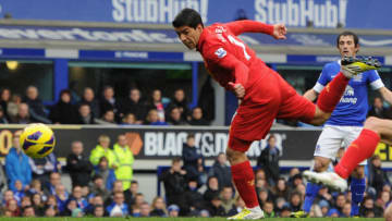 LIVERPOOL, ENGLAND - OCTOBER 28: Luis Suarez of Liverpool scores his team's second goal during the Barclays Premier League match between Everton and Liverpool at Goodison Park on October 28, 2012 in Liverpool, England. (Photo by Chris Brunskill/Getty Images)