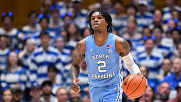 Caleb Love plays against the Duke basketball team (Photo by Grant Halverson/Getty Images)