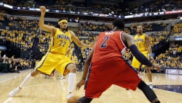 May 5, 2014; Indianapolis, IN, USA; Indiana Pacers forward Chris Copeland (22) guards Washington Wizards guard John Wall (2) in game one of the second round of the 2014 NBA Playoffs at Bankers Life Fieldhouse. Washington won 102-96. Mandatory Credit: Brian Spurlock-USA TODAY Sports