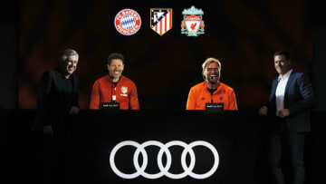 MUNICH, GERMANY - MAY 12: Carlo Ancelotti head coach of FC Bayern Munich,Diego Simeone head coach of Atletico de Madrid,Juergen Klopp head coach of Liverpool FC, andThomas Glas of AUDI AG pose for a photo after the Audi Cup 2017 Hologram-Press Conference at the FC Bayern Training Grounds on May 12, 2017 in Munich, Germany. (Photo by Adam Pretty/Getty Images)