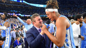 Apr 2, 2022; New Orleans, LA, USA; ESPN personality Andy Katz interviews North Carolina Tar Heels forward Armando Bacot (5) after the game against the Duke Blue Devils during the 2022 NCAA men's basketball tournament Final Four semifinals at Caesars Superdome. Mandatory Credit: Bob Donnan-USA TODAY Sports