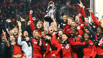 TORONTO, ON - DECEMBER 09: Michael Bradley #4 of Toronto FC lifts the Championship Trophy after winning the 2017 MLS Cup Final against the Seattle Sounders at BMO Field on December 9, 2017 in Toronto, Ontario, Canada. (Photo by Vaughn Ridley/Getty Images)