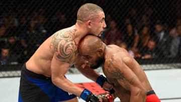 LAS VEGAS, NV - JULY 08: (R-L) Yoel Romero of Cuba attempts to take down Robert Whittaker of New Zealand in their interim UFC middleweight championship bout during the UFC 213 event at T-Mobile Arena on July 8, 2017 in Las Vegas, Nevada. (Photo by Josh Hedges/Zuffa LLC/Zuffa LLC via Getty Images)