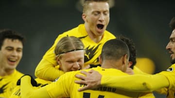 Borussia Dortmund players celebrate a goal (Photo by LEON KUEGELER/POOL/AFP via Getty Images)