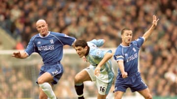 21 Oct 2000: John Aloisi of Coventry City takes on Frank Leboeuf (left) and Dennis Wise (right) of Chelsea during the FA Carling Premiership match played at Stamford Bridge, in London. Chelsea won the match 6-1. \ Mandatory Credit: Clive Brunskill /Allsport