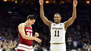 Mar 25, 2016; Philadelphia, PA, USA; Notre Dame Fighting Irish guard Demetrius Jackson (11) and Wisconsin Badgers guard Bronson Koenig (24) react after a semifinal game in the East regional of the NCAA Tournament at Wells Fargo Center. Notre Dame won 61-56. Mandatory Credit: Bob Donnan-USA TODAY Sports