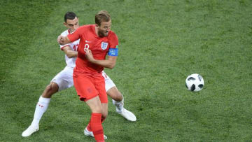 Tunisia's midfielder Ellyes Skhiri (L) vies for the ball with England's forward Harry Kane during the Russia 2018 World Cup Group G football match between Tunisia and England at the Volgograd Arena in Volgograd on June 18, 2018. (Photo by NICOLAS ASFOURI / AFP) / RESTRICTED TO EDITORIAL USE - NO MOBILE PUSH ALERTS/DOWNLOADS (Photo credit should read NICOLAS ASFOURI/AFP/Getty Images)