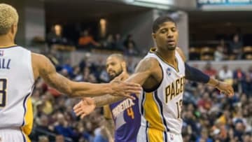 Jan 12, 2016; Indianapolis, IN, USA; Indiana Pacers forward Paul George (13) is congratulated by guard George Hill (3) in the second half of the game against the Phoenix Suns at Bankers Life Fieldhouse. The Indiana Pacers beat the Phoenix Suns by the score of 116-97. Mandatory Credit: Trevor Ruszkowski-USA TODAY Sports