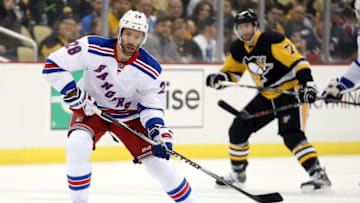 Mar 3, 2016; Pittsburgh, PA, USA; New York Rangers center Dominic Moore (28) skates with the puck against the Pittsburgh Penguins during the first period at the CONSOL Energy Center. Mandatory Credit: Charles LeClaire-USA TODAY Sports