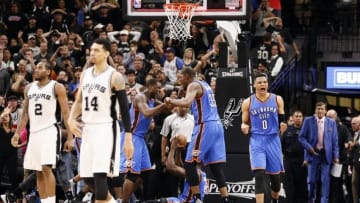 May 2, 2016; San Antonio, TX, USA; Oklahoma City Thunder point guard Russell Westbrook (0), and small forward Kevin Durant (35), and teammates celebrate a victory over the San Antonio Spurs in game two of the second round of the NBA Playoffs at AT&T Center. Mandatory Credit: Soobum Im-USA TODAY Sports