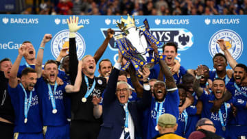LEICESTER, ENGLAND - MAY 07: Captain Wes Morgan and manager Claudio Ranieri of Leicester City lift the Premier League Trophy after the Barclays Premier League match between Leicester City and Everton at The King Power Stadium on May 7, 2016 in Leicester, United Kingdom. (Photo by Laurence Griffiths/Getty Images)