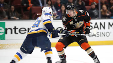 ANAHEIM, CALIFORNIA - MARCH 06: Troy Terry #61 of the Anaheim Ducks skates with the puck as Vince Dunn #29 of the St. Louis Blues defends during the third period of a game at Honda Center on March 06, 2019 in Anaheim, California. (Photo by Sean M. Haffey/Getty Images)