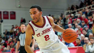 NEW YORK, NY - NOVEMBER 12: Julian Champagnie #2 of the St. John's basketball team dribbles the ball against the New Hampshire Wildcats during a game at Carnesecca Arena on November 12, 2019, in the Queens borough of New York City. (Photo by Porter Binks/Getty Images)