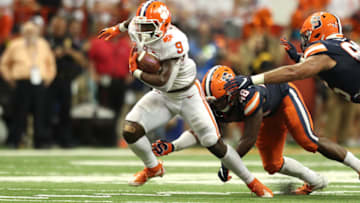 SYRACUSE, NEW YORK - SEPTEMBER 14: Travis Etienne #9 of the Clemson Tigers runs the ball during a game against the Syracuse Orange at the Carrier Dome on September 14, 2019 in Syracuse, New York. (Photo by Bryan M. Bennett/Getty Images)