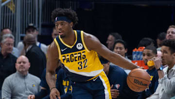 Apr 3, 2022; Indianapolis, Indiana, USA; Indiana Pacers guard Terry Taylor (32) dribbles the ball in the first half against the Detroit Pistons at Gainbridge Fieldhouse. Mandatory Credit: Trevor Ruszkowski-USA TODAY Sports