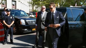 Aug 12, 2015; New York, NY, USA; New England Patriots quarterback Tom Brady enters federal court for a hearing over the legality of Brady's four game suspension for his involvement in the Patriots alleged deflation of footballs prior to last seasons AFC Championship Game against the Indianapolis Colts. Mandatory Credit: Andy Marlin-USA TODAY Sports