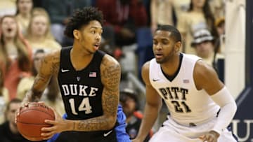 Feb 28, 2016; Pittsburgh, PA, USA; Duke Blue Devils guard Brandon Ingram (14) handles the ball against Pittsburgh Panthers forward Sheldon Jeter (21) during the first half at the Petersen Events Center. PITT won 76-62. Mandatory Credit: Charles LeClaire-USA TODAY Sports