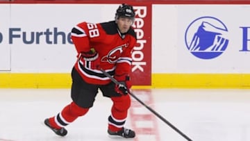 Nov 16, 2013; Newark, NJ, USA; New Jersey Devils right wing Jaromir Jagr (68) skates with the puck during the third period of their game against the Pittsburgh Penguins at the Prudential Center. The Devils defeated the Penguins 4-1. Mandatory Credit: Ed Mulholland-USA TODAY Sports