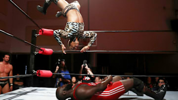 HOBOKEN, NEW JERSEY - DECEMBER 29: Sonny Kiss does a backflip takedown off the top rope during Capitol Wrestling World War IV on December 29, 2017 at Capitol Auditorium in Hoboken, New Jersey. (Photo by Elsa/Getty Images)