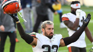 Dec 6, 2020; Nashville, Tennessee, USA; Cleveland Browns free safety Andrew Sendejo (23) celebrates as he leaves the field after a win against the Tennessee Titans at Nissan Stadium. Mandatory Credit: Christopher Hanewinckel-USA TODAY Sports
