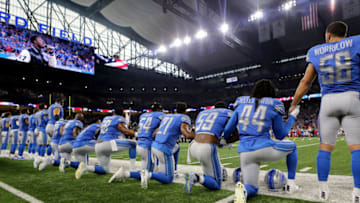 DETROIT, MI - SEPTEMBER 24: Members of the Detroit Lions take a knee during the playing of the national anthem prior to the start of the game against the Atlanta Falcons at Ford Field on September 24, 2017 in Detroit, Michigan. (Photo by Rey Del Rio/Getty Images)