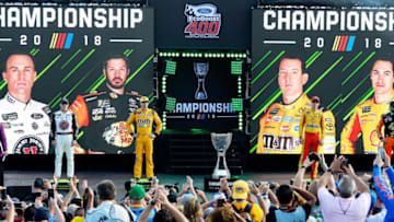 HOMESTEAD, FL - NOVEMBER 18: Kevin Harvick, driver of the #4 Jimmy John's Ford, Kyle Busch, driver of the #18 M&M's Toyota, Joey Logano, driver of the #22 Shell Pennzoil Ford, and Martin Truex Jr., driver of the #78 Bass Pro Shops/5-hour ENERGY Toyota, are introduced during pre-race ceremonies for the Monster Energy NASCAR Cup Series Ford EcoBoost 400 at Homestead-Miami Speedway on November 18, 2018 in Homestead, Florida. (Photo by Robert Laberge/Getty Images)