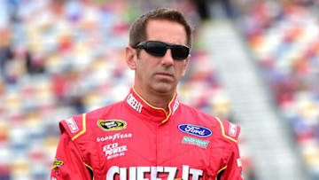 CHARLOTTE, NC - MAY 21: Greg Biffle, driver of the #16 Cheez-It Ford, walks on the grid prior to the NASCAR Sprint Cup Series Sprint Showdown at Charlotte Motor Speedway on May 21, 2016 in Charlotte, North Carolina. (Photo by Jared C. Tilton/Getty Images)