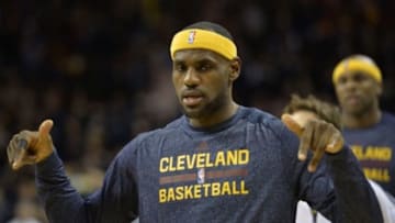 Oct 30, 2014; Cleveland, OH, USA; Cleveland Cavaliers forward LeBron James warms up prior to the game against the New York Knicks at Quicken Loans Arena. Mandatory Credit: David Richard-USA TODAY Sports