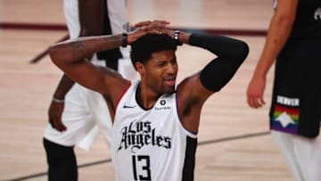 Sep 9, 2020; Lake Buena Vista, Florida, USA; LA Clippers guard Paul George (13) reacts in the first half against the Denver Nuggets in game four of the second round of the 2020 NBA Playoffs at AdventHealth Arena. Mandatory Credit: Kim Klement-USA TODAY Sports