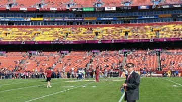 Oct 20, 2013; Landover, MD, USA; Washington Redskins owner Daniel Snyder on the field before the game against the Chicago Bears at FedEX Field. Mandatory Credit: Brad Mills-USA TODAY Sports