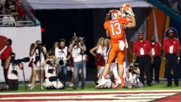 Dec 31, 2015; Miami Gardens, FL, USA; Clemson Tigers wide receiver Hunter Renfrow (13) celebrates his touchdown with wide receiver Trevion Thompson (1) during the third quarter of the 2015 CFP semifinal at the Orange Bowl against the Oklahoma Sooners at Sun Life Stadium. Mandatory Credit: Steve Mitchell-USA TODAY Sports