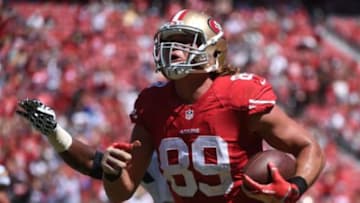 August 24, 2014; Santa Clara, CA, USA; San Francisco 49ers tight end Vance McDonald (89) scores a touchdown against the San Diego Chargers during the second quarter at Levi