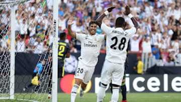 LANDOVER, MD - AUGUST 04: Marco Asensio #20 of Real Madrid celebrates with Vinicius Junior #28 of Real Madrid during the International Champions Cup at FedExField on August 4, 2018 in Landover, Maryland. (Photo by Patrick Smith/International Champions Cup/Getty Images)