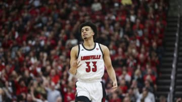 LOUISVILLE, KENTUCKY - FEBRUARY 08: Jordan Nwora #33 of the Louisville Cardinals celebrates making a three point shot against the Virginia Cavaliers during the first half of the game at KFC YUM! Center on February 08, 2020 in Louisville, Kentucky. (Photo by Silas Walker/Getty Images)