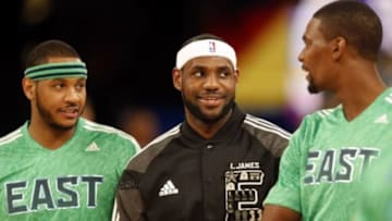 Feb 16, 2014; New Orleans, LA, USA; Eastern Conference forward Carmelo Anthony (7) of the New York Knicks, forward LeBron James (6) of the Miami Heat and forward Chris Bosh (1) of the Miami Heat talk before the 2014 NBA All-Star Game at the Smoothie King Center. Mandatory Credit: Derick E. Hingle-USA TODAY Sports