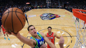 Dwight Powell #7 of the Dallas Mavericks shoots against Nicolo Melli #20 of the New Orleans Pelicans (Photo by Jonathan Bachman/Getty Images)