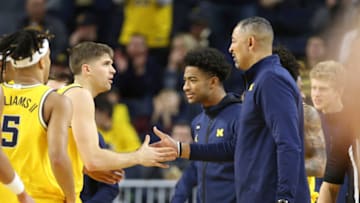 Jan 1, 2023; Ann Arbor, Michigan, USA; Michigan Wolverines head coach Juwan Howard high fives guard Joey Baker (15) during the first half against the Maryland Terrapins at Crisler Center. Mandatory Credit: Brian Bradshaw Sevald-USA TODAY Sports
