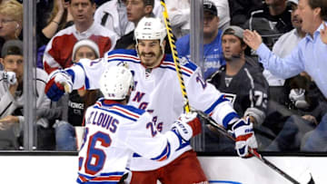 LOS ANGELES, CA - JUNE 13: Brian Boyle #22 of the New York Rangers celebrates with teammate Martin St. Louis #26 after Boyle scores a second period goal past goaltender Jonathan Quick #32 of the Los Angeles Kings during Game Five of the 2014 Stanley Cup Final at Staples Center on June 13, 2014 in Los Angeles, California. (Photo by Harry How/Getty Images)