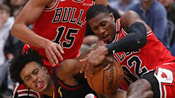 CHICAGO, ILLINOIS - JANUARY 18: Kris Dunn #32 of the Chicago Bullsforces a jump ball with Collin Sexton #2 of the Cleveland Cavaliers at the United Center on January 18, 2020 in Chicago, Illinois. The Bulls defeated the Cavaliers 118-116. NOTE TO USER: User expressly acknowledges and agrees that, by downloading and or using this photograph, User is consenting to the terms and conditions of the Getty Images License Agreement. (Photo by Jonathan Daniel/Getty Images)