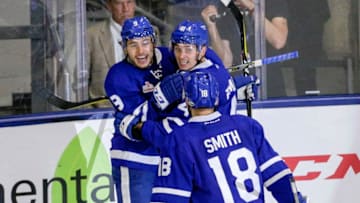 TORONTO, ON - JUNE 2 - Trevor Moore of the Marlies (9) celebrates his goal with his line mates Dmytro Timashov (41) and Ben Smith (18) during the 3rd period of the Calder Cup Finals game 1 as the Toronto Marlies host the Texas Stars at the Ricoh Coliseum on June 2, 2018. The Marlies defeated the Stars 6-5 (Carlos Osorio/Toronto Star via Getty Images)