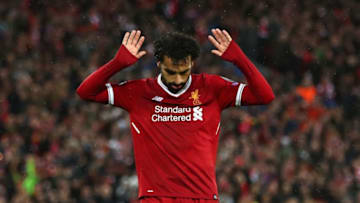 LIVERPOOL, ENGLAND - APRIL 24: Mohamed Salah of Liverpool celebrates as he scores his sides second goal during the UEFA Champions League Semi Final First Leg match between Liverpool and A.S. Roma at Anfield on April 24, 2018 in Liverpool, United Kingdom. (Photo by Clive Brunskill/Getty Images)
