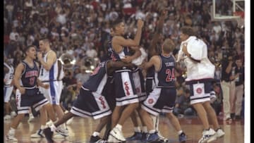 31 Mar 1997: Members of Arizona Wildcats celebrate after the NCAA Championship game against the Kentucky Wildcats at the RCA Dome in Indianapolis, Indiana. Arizona won the game 84 - 79. Mandatory Credit: Brian Bahr /Allsport
